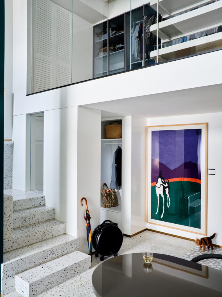 These are two apartments merged into one, filled with natural light and with bold artworks and trendy furniture