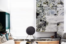 a stone clad fireplace in a modern space
