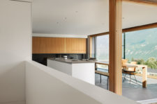 04 The interiors are done in minimalist style continuing the exterior aesthetics and the decor is very simple and laconic