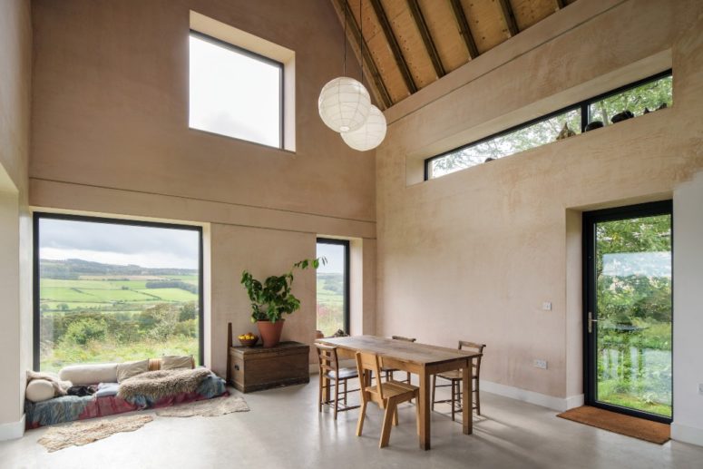 The furniture is rather eclectic, the textiles are bold and bright and add eye-catchiness to the spaces