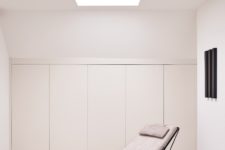 09 I love this minimalist nook that features much storage space and a skylight with a lounger – so cool to read here