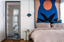 12 Catchy furniture is seen here, too – look at this curved glass unit for storage