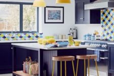 a bright and cheerful kitchen done in bold blue and sunny yellow, with catchy scale tiles and white surfaces for a refresh