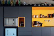 a functional super stylish kitchen design in black and yellow