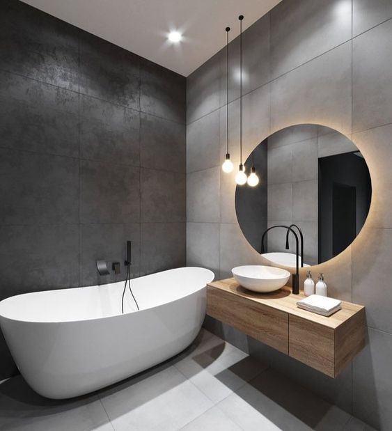 a stylish bathroom with a floating vanity