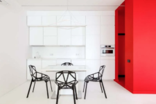 01 This bright and ultra-modern apartment is characterized with bright splashes of color here and there and looks super bold