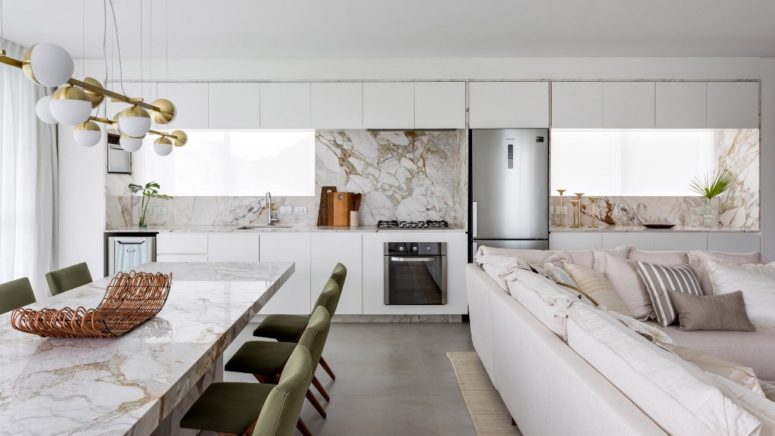This luxurious modern apartment features Brazilian marble and local designs plus local Brazilian types of wood