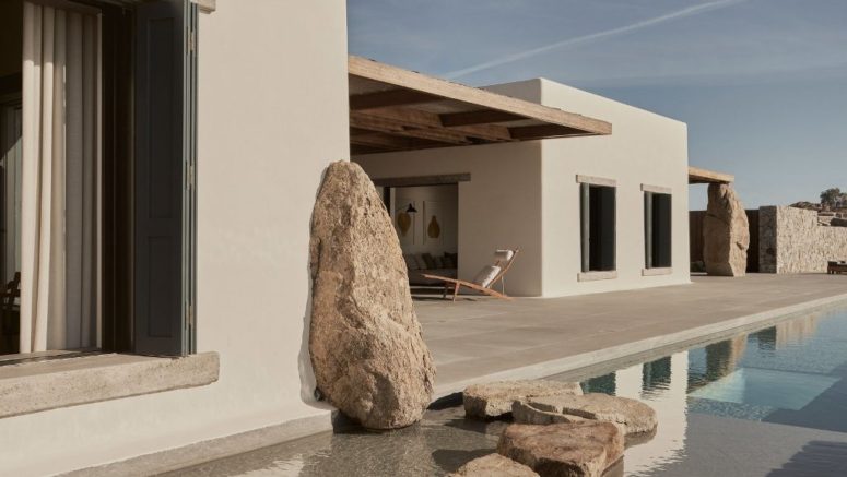 Real rocks are incorporated into the design of the house