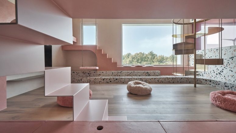 The house is done in contemporary style and features millenial pink and lots of terrazzo for a fun touch The house is done in contemporary style and features millenial pink and lots of terrazzo for a fun touch