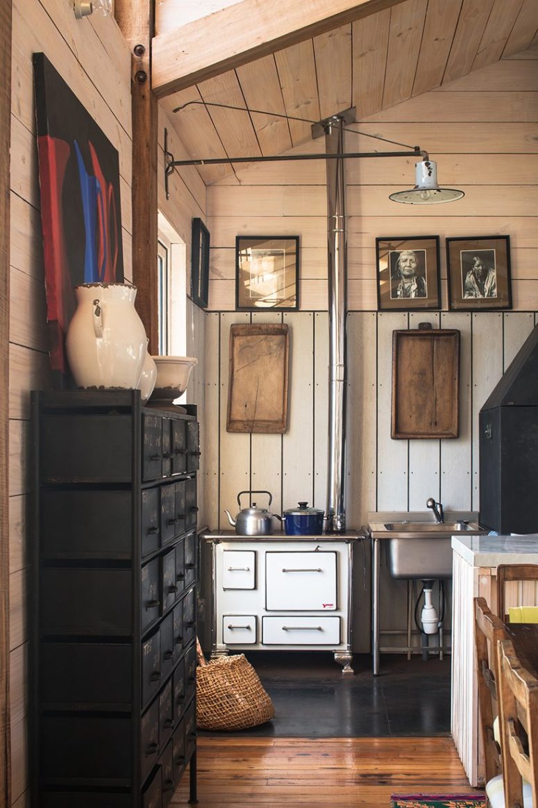 vintage furniture adds a charming and stylish touch to interiors The house features lots of vintage furniture and appliances, cool artworks that create a charming feel here