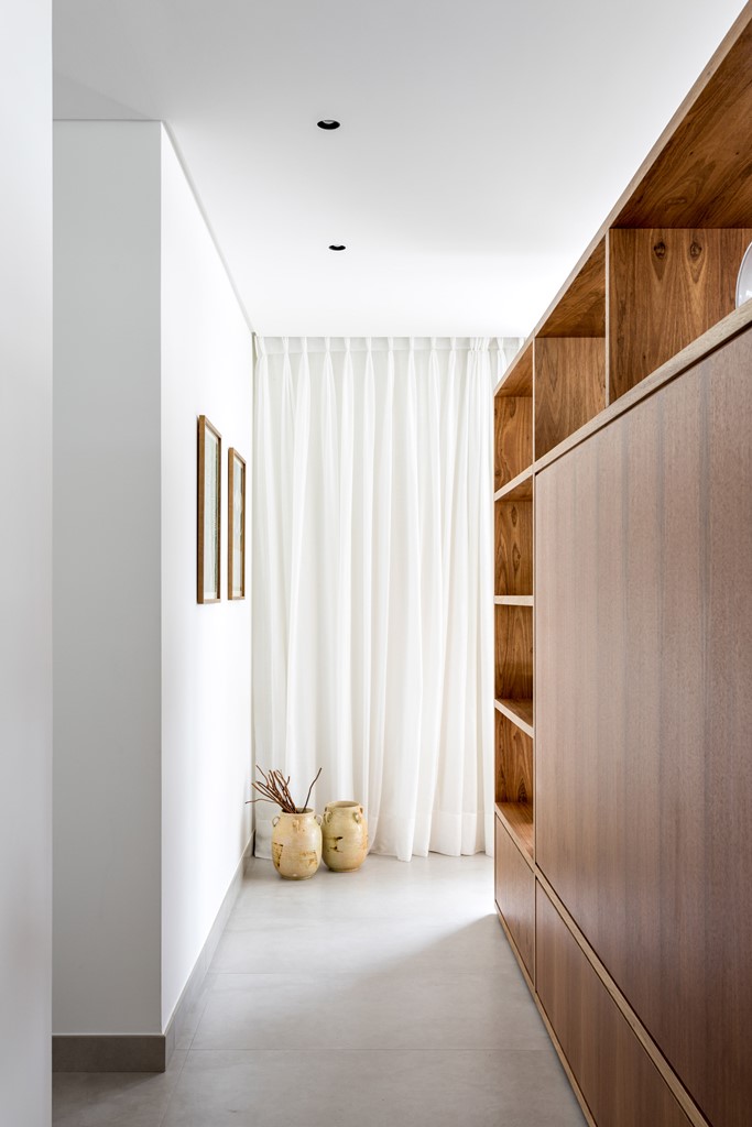 The storage unit separates the main layout from the private zones that come behind