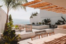 01 This stunning vacation home is located in Corsica and shows off amazing views of the sea and coast