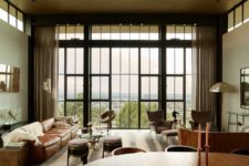 02 The color palette is warm and cool, with many neutrals and cool materials like leather, wood, stone