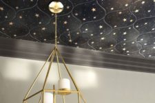 02 a beautiful black starry tile ceiling accented with a gold candle chandelier is a very bold and chic idea