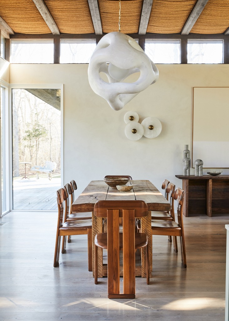 The furniture is a mix of designer items and second hand finds and the balance is perfect