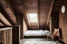 05 The upstairs bedroom area has a very cozy attic-like feeling due to the slanted ceiling