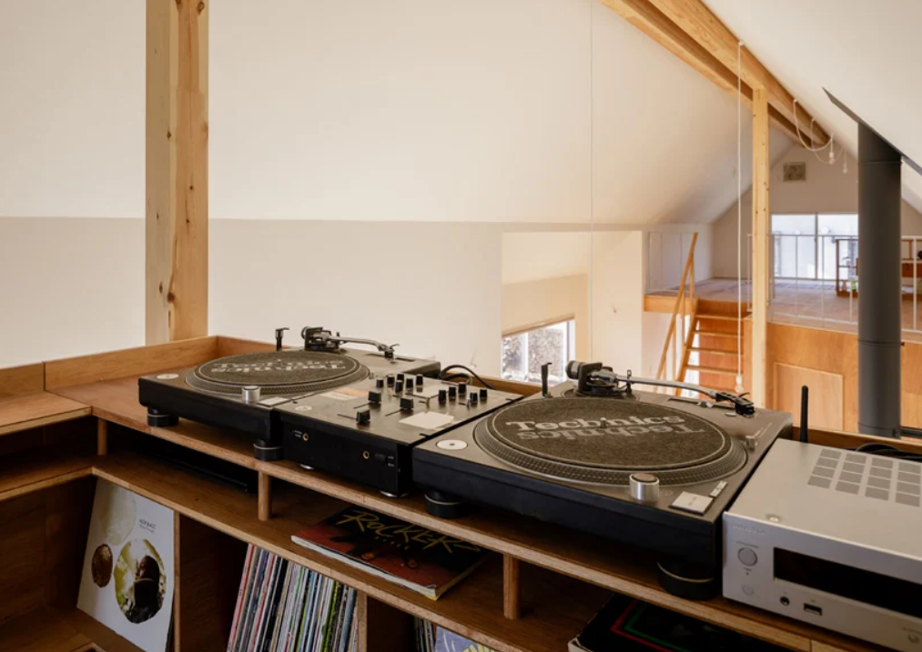 The upper space is a DJ booth, which makes the house cool for parties