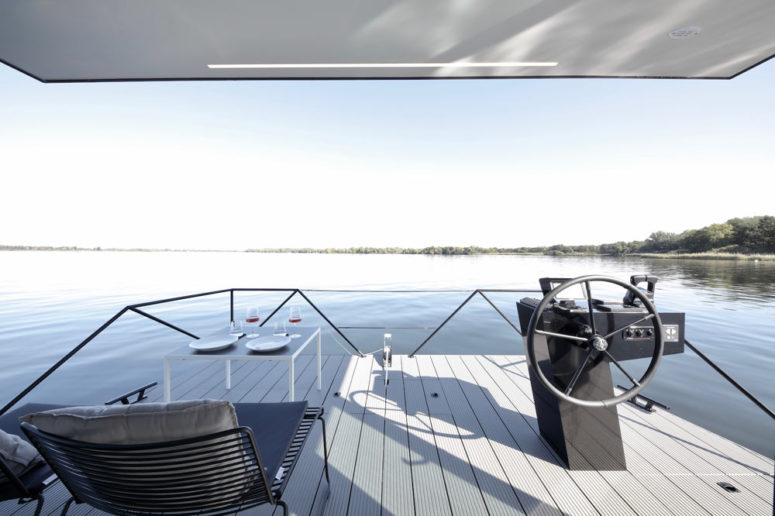 There's a small table for meals with a gorgeous view, which is amazing for water lovers