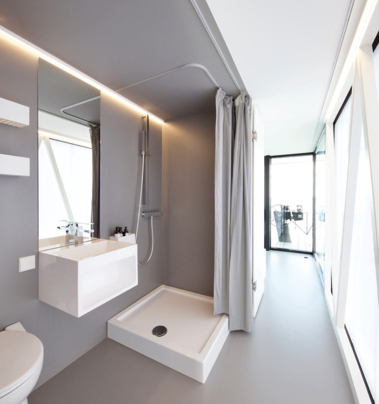 a small yet practical bathroom with a shower