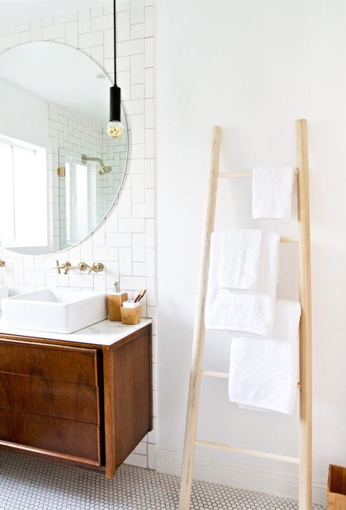 https://www.digsdigs.com/photos/2020/06/23-a-simple-wooden-ladder-with-some-towels-is-a-cool-space-saving-towel-storage-idea-for-every-kind-of-bathroom.jpg