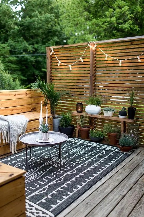 a simple wooden plank fence is what you can easily build for separating your space from the others