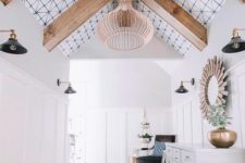 a stylish entryway with a printed wallpaper ceiling with wooden beams looks more unusual and more modern