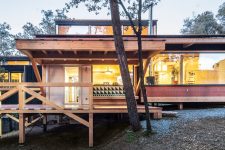 01 This stylish contemporary home in the woods near Barcelona is built to keep the existing topography and all the trees