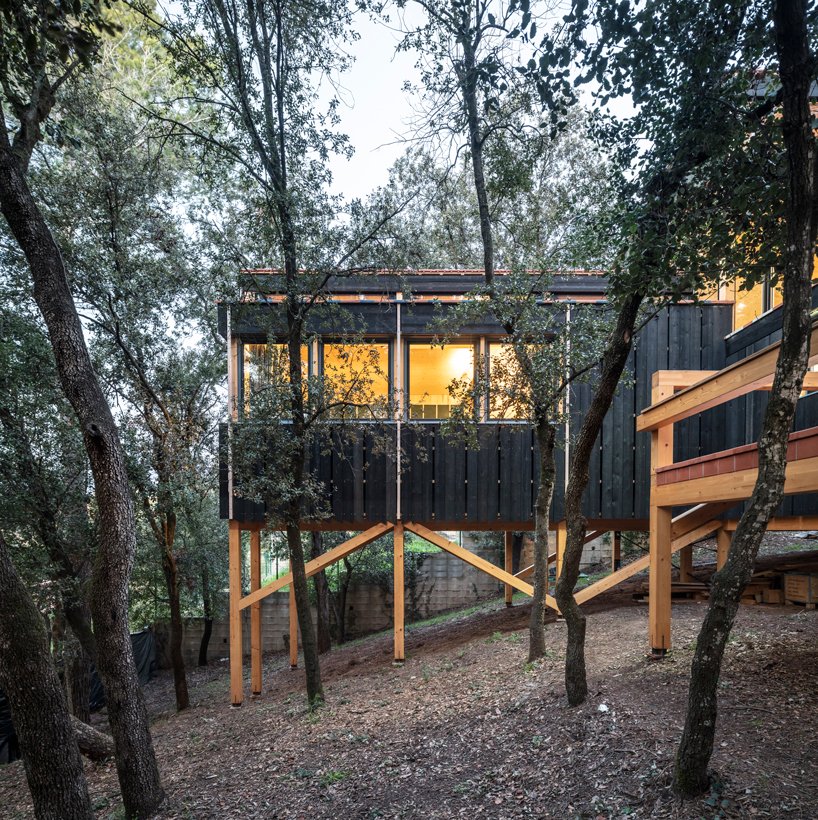 The house features much wood in design, both indoors and outdoors