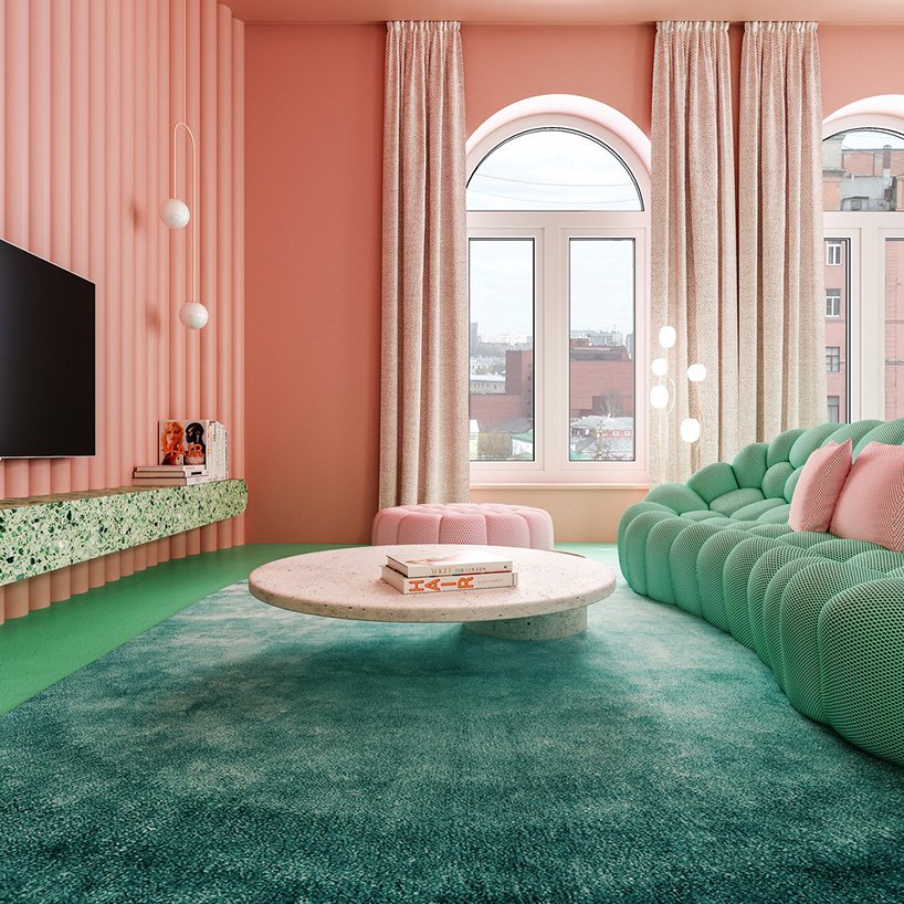 a glam living room with pink walls
