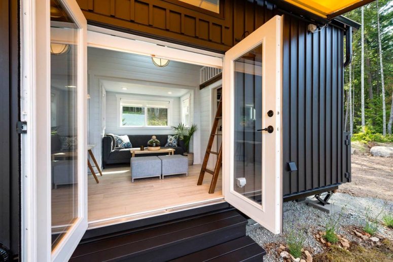 A set of double doors leads straight into the living area and open up the interior to the surroundings A set of double doors leads straight into the living area and open up the interior to the surroundings