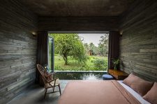 a cool bedroom with a view of a pond