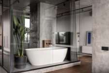 04 The bathroom is at the center of the apartment and has a stylish and sophisticated design
