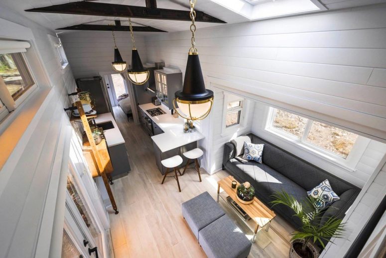 The interior is spacious, the layout is long and narrow, with a living room, kitchen, bedroom and a bathroom The interior is spacious, the layout is long and narrow, with a living room, kitchen, bedroom and a bathroom
