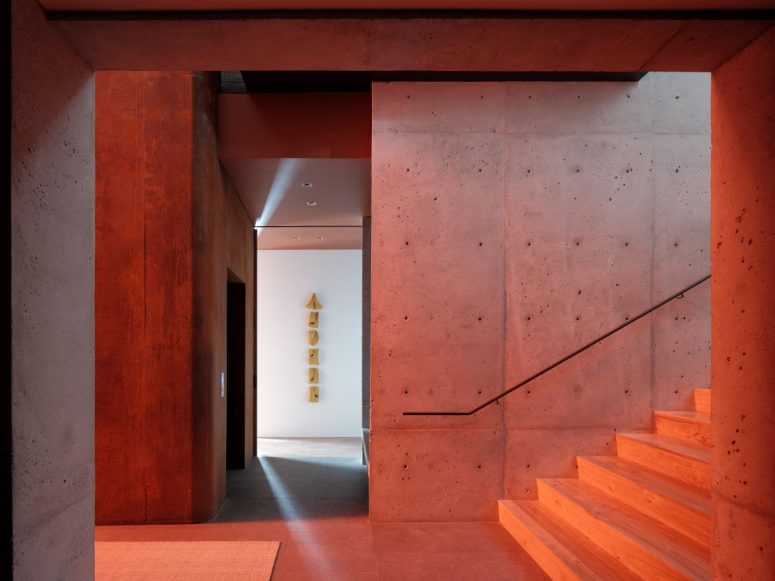 The colored windows also bathe the staircase is warm light and add a lot of character to the interior as a whole The colored windows also bathe the staircase is warm light and add a lot of character to the interior as a whole