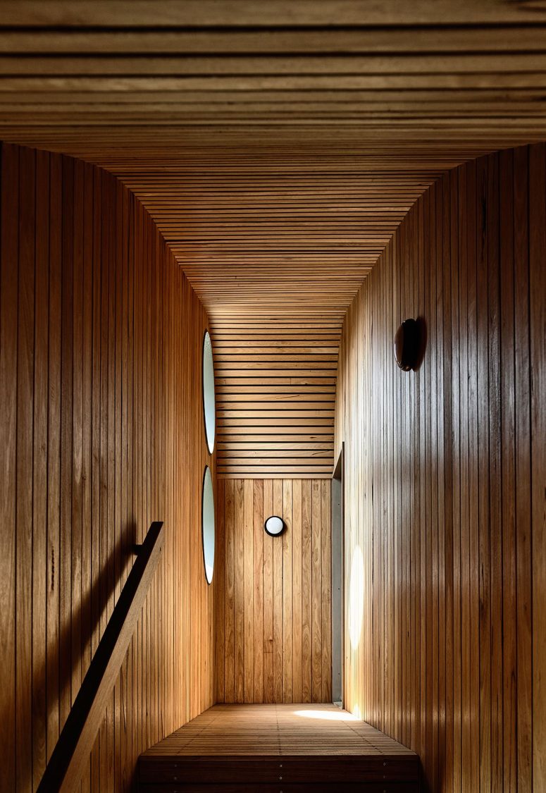 That much wood in decor reminds of ships, which was done to hint on the coastal location