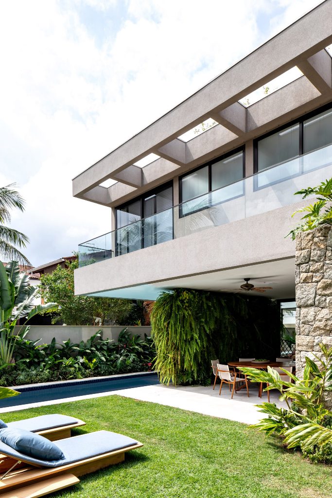 This gorgeous contemporary house is located in Brazil and features outdoor indoor living at its best