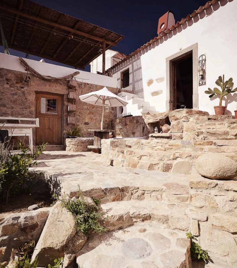 This modern home with strong Mediterranean touches is built out of a ruined rural house in Portugal