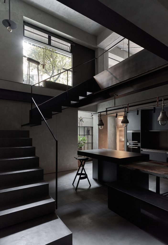 The material palette is simple, with concrete, stone and metal, all of them are in dark and the lamps are dark, too The material palette is simple, with concrete, stone and metal, all of them are in dark and the lamps are dark, too