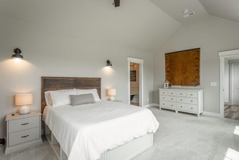 This bedroom is all-natural, with a rough wooden headboard for a cozy feel and a catchy vintage map on the wall