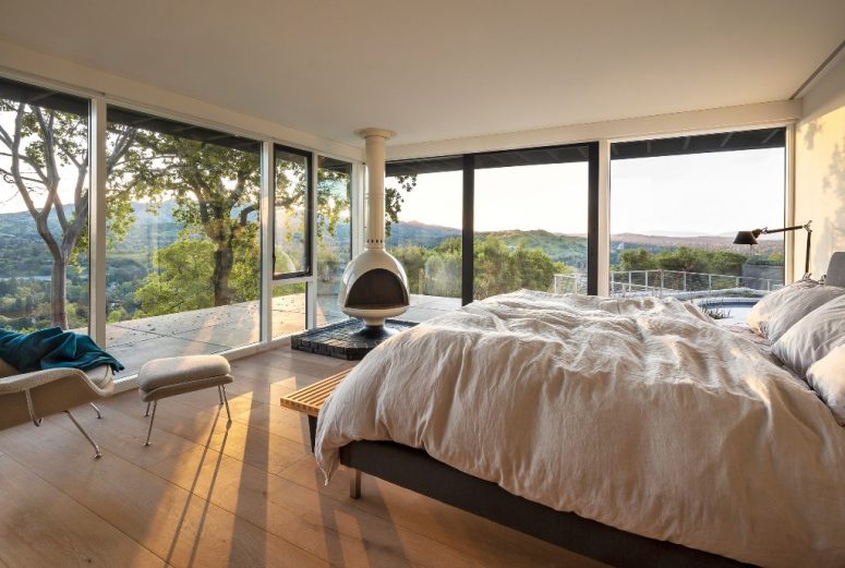 Bedrooms like this one feature fantastic views thanks to extensive glazing