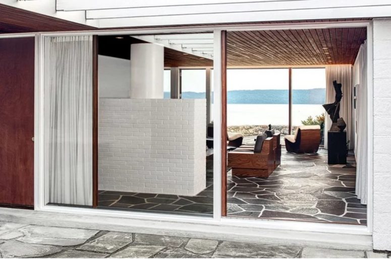 Indoors you may see lovely modernist furniture and thanks to glazings, all the spaces can be opened to outdoors anytime