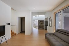 06 Indoors the interiors feel spacious and contemporary, with simple and comfy furniture and some vintage details for an accent