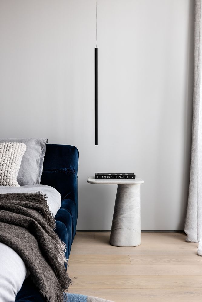 The bedrooms are simplistic and airy but they too welcome stone into their stylish interiors