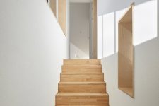 09 The house feels airy and welcoming inside and catchy and statement-like outside