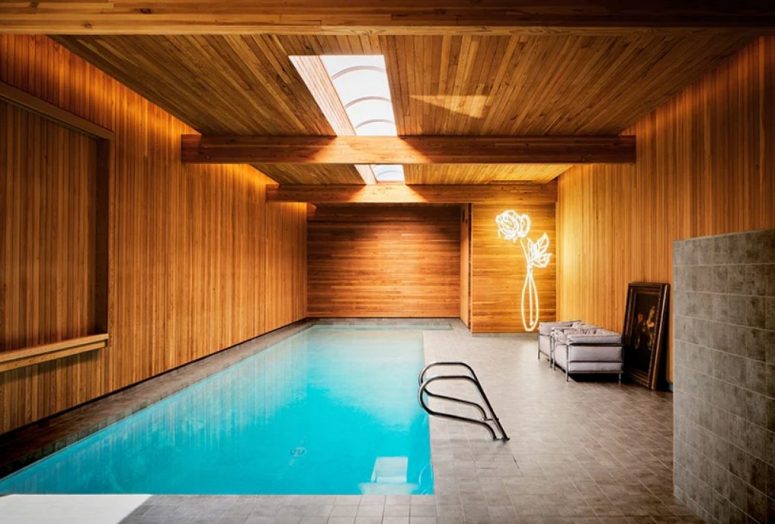 There's a large indoor pool in a wood clad pavilion with skylights, here you may also see refined art and furniture