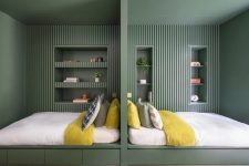 02 Here’s a peaceful double bedroom done in greens, with wooden slabs and niches for storage