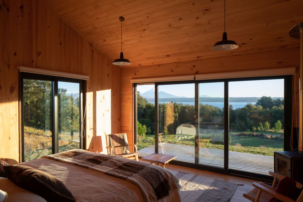 a cozy bedroom interior clad with wood