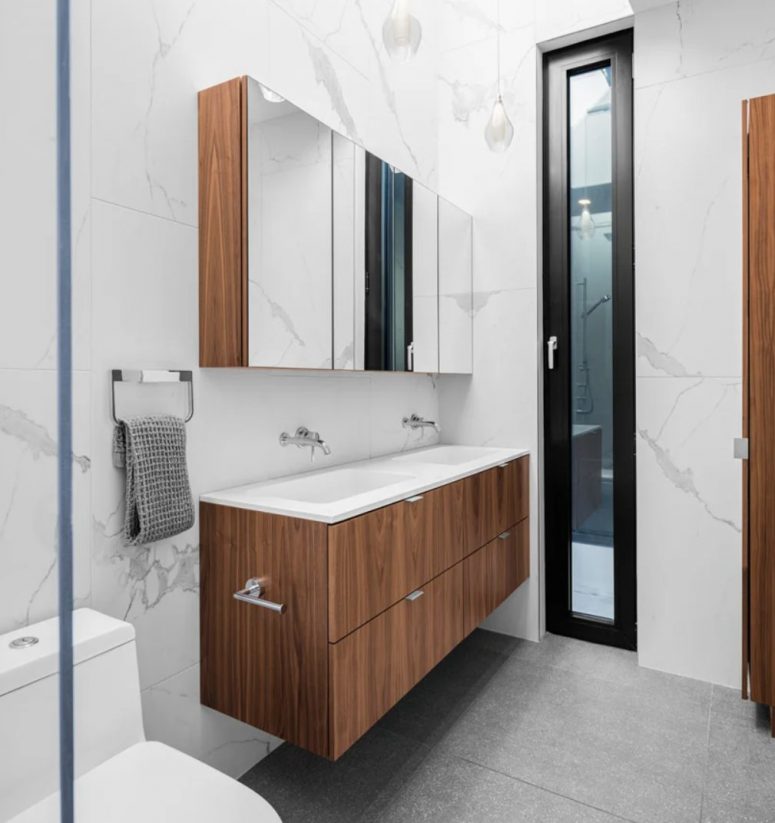 a modern bathroom with a floating vanity