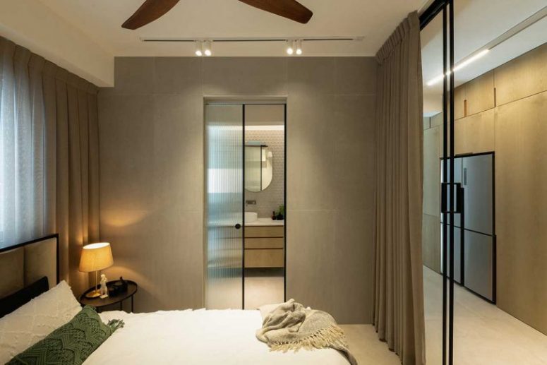 Here's an entrance to the bathroom via glass doors