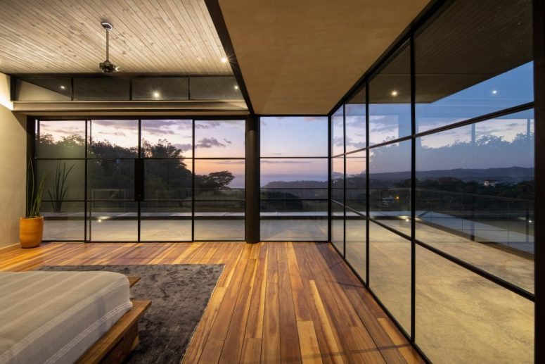 The bedrooms have access to their own spacious terraces and get to frame views of the ocean and the mountains